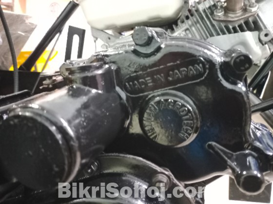 ধানকাটা রিপার মেশিন